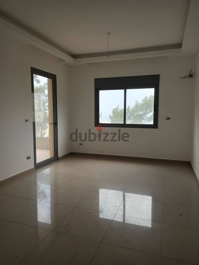 100m2 apartment having  mountain/sea view for sale in Tilal Ain Saadeh 9
