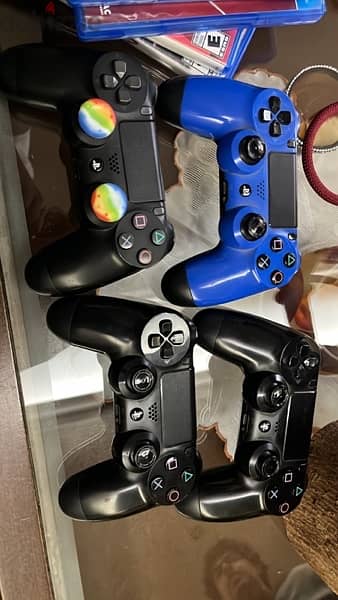 ps4 Slim 1tb + 4 controllers and 8 cds 4
