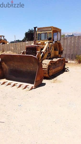 caterpillar 955L 11000$