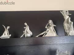 set of four statues
