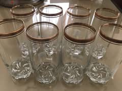 Long glass cups with gold trim. Brand new.