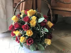 Basket with artificial roses