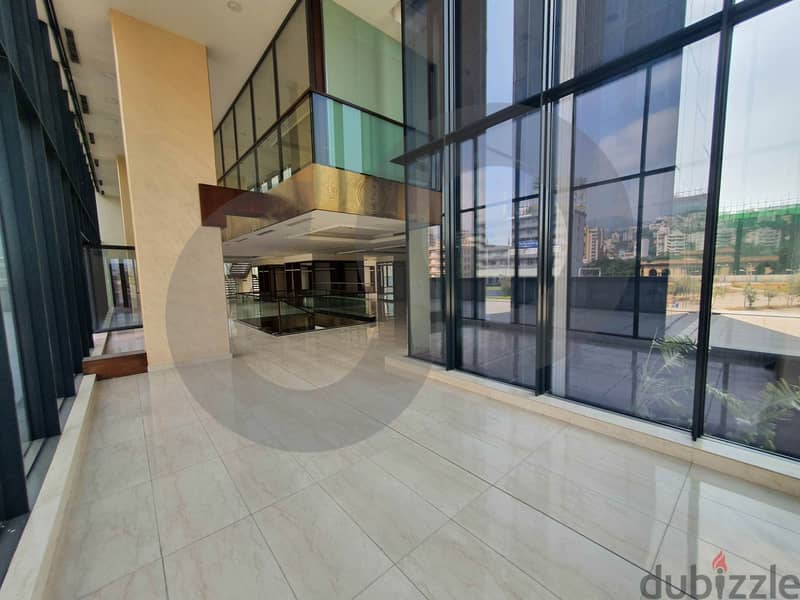 1000sqm showroom in Dbayeh highway equipped for rent. REF#KH94149 4