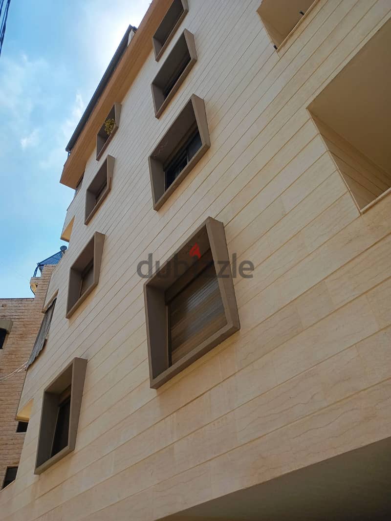 150m2 apartment having open sea view in a calm area for sale in Zikrit 9