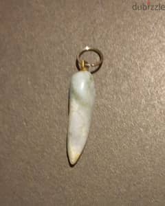 vintage polished stone tooth pendant