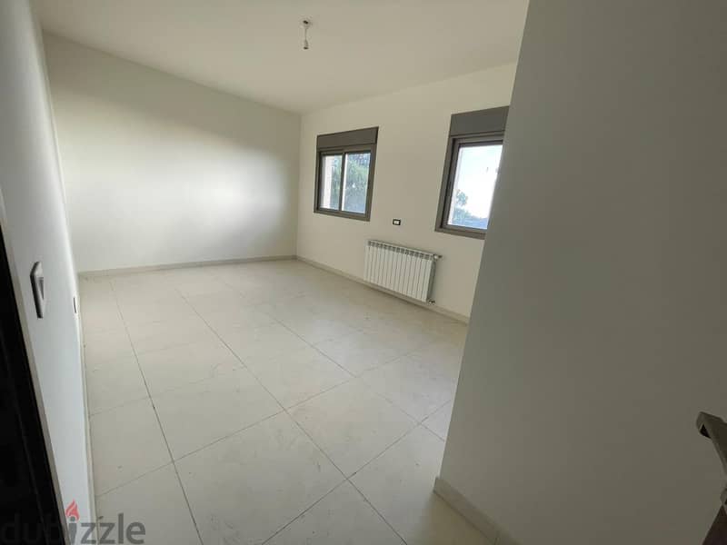 RWK124JS - Apartment For Sale in Ballouneh  - شقة للبيع في بلونة 3