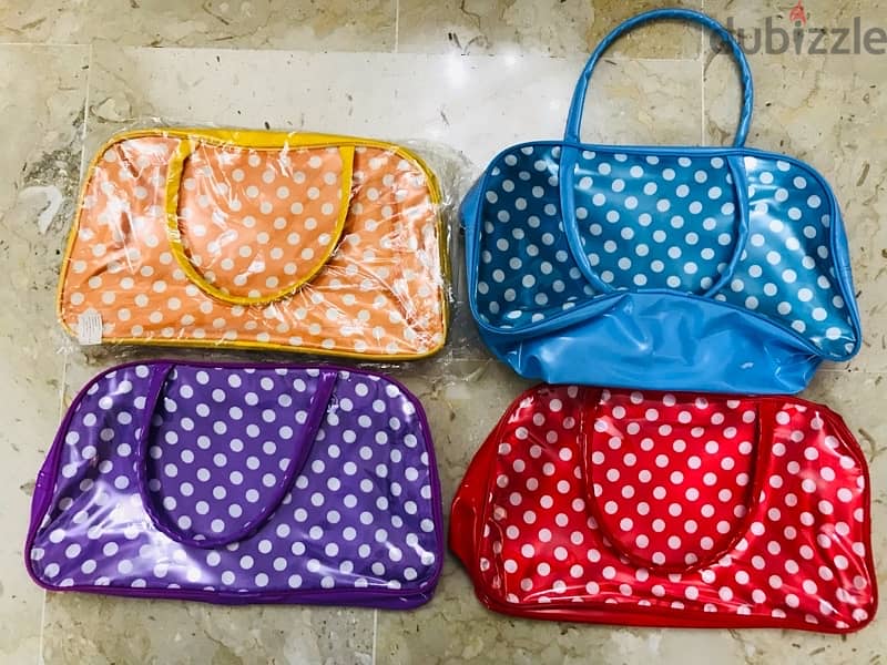 Four colourfull handbags. Selling all together 0