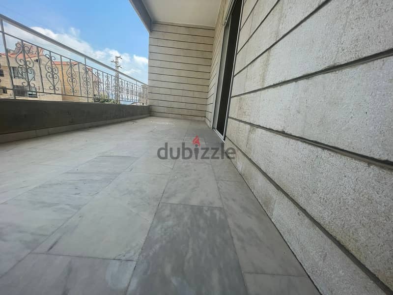 RWK126JS - Apartment With Terrace For Sale in Ballouneh 0