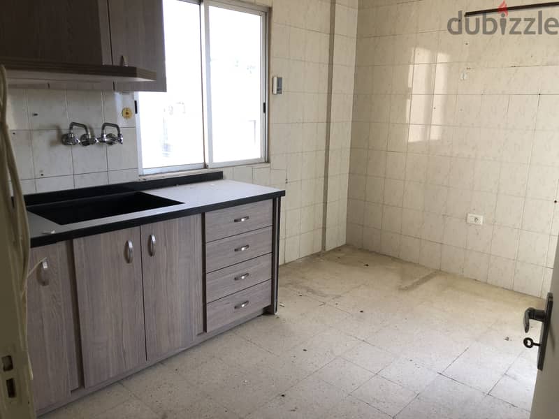 RWB104CA - Apartment for sale in Amchit Jbeil شقة للبيع في عمشيت جبيل 1