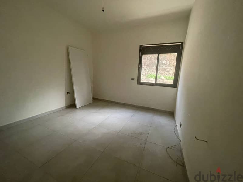 RWK131JS - Apartment For Sale in Ballouneh - شقة للبيع في بلونة 3