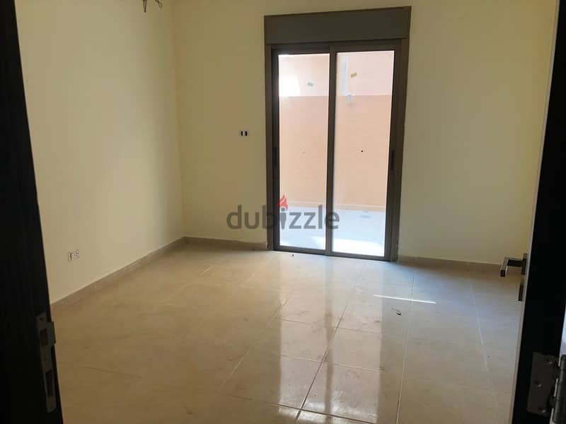 RWK101RH - Apartment For Sale in Bouar  شقة للبيع في البوار 3