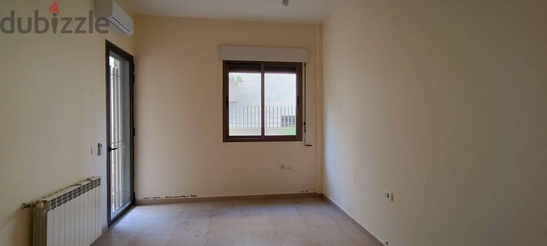 L12891-Spacious Apartment with Garden for Sale in Kfarhbeib 2