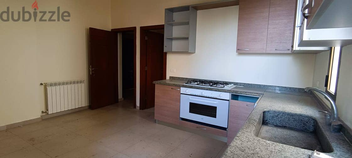 L12891-Spacious Apartment with Garden for Sale in Kfarhbeib 4