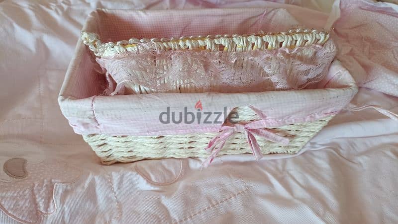 baskets for newborn girls matching with crib cover. 2