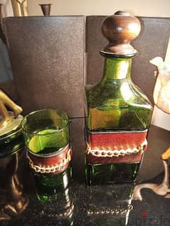 Vintage set of green bottle glass decanter with leather wrap