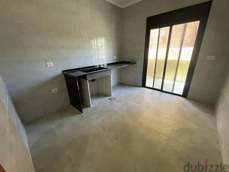 L13037-Apartment With Terrace for Sale In Basbina-Batroun 1