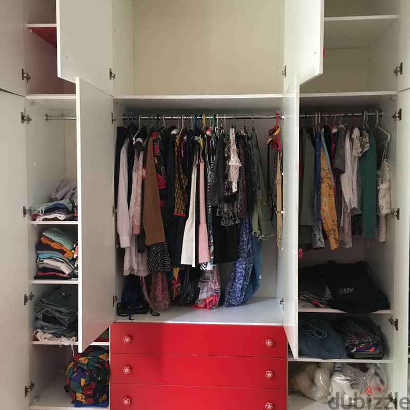 Closet for clothes with red bed for child bedroom. 5