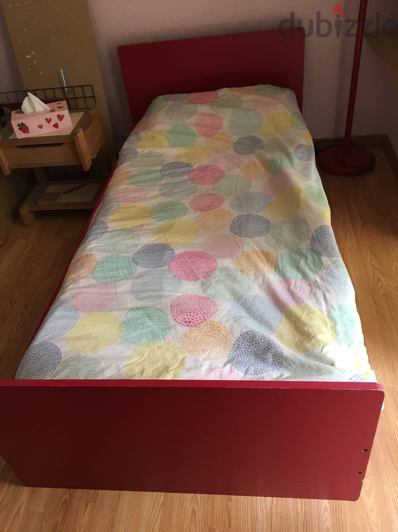 Closet for clothes with red bed for child bedroom. 6