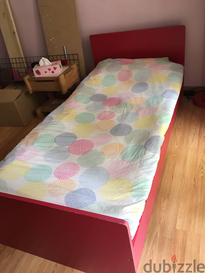 Closet for clothes with red bed for child bedroom. 7
