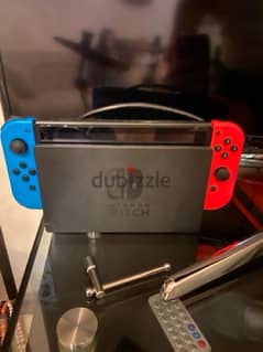 nintendo switch V2 like new+micro sd and 1game with all his accesories