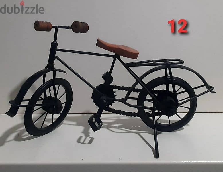hand made old vintage cars and bycycle. 2