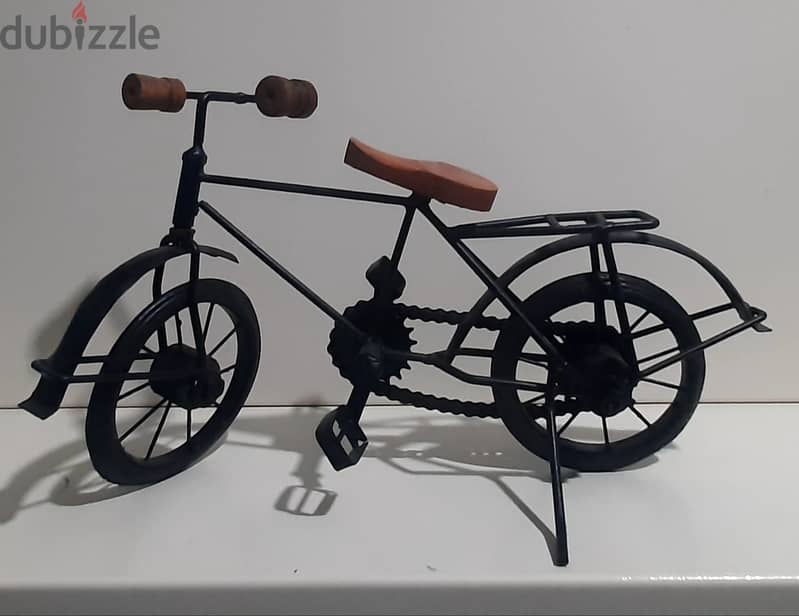 hand made old vintage cars and bycycle. 10