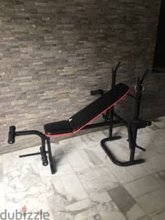 bench adjustable with rack and legs like new