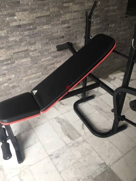 bench adjustable with rack and legs like new 1