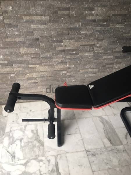 bench adjustable with rack and legs like new 3
