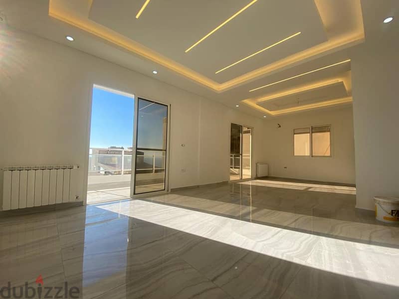 A 175 m2 apartment having partial sea view for sale in Sahel Aalma 1