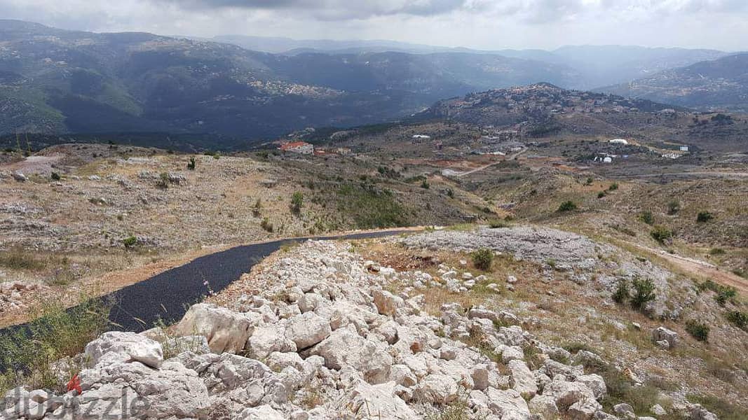 A 1617 m2 land having an open mountain view for sale in Zaarour 2
