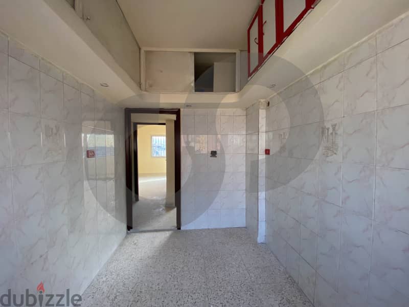 REF#HE96480 Own this cozy apartment in the heart of Burj Al Barajina. 3