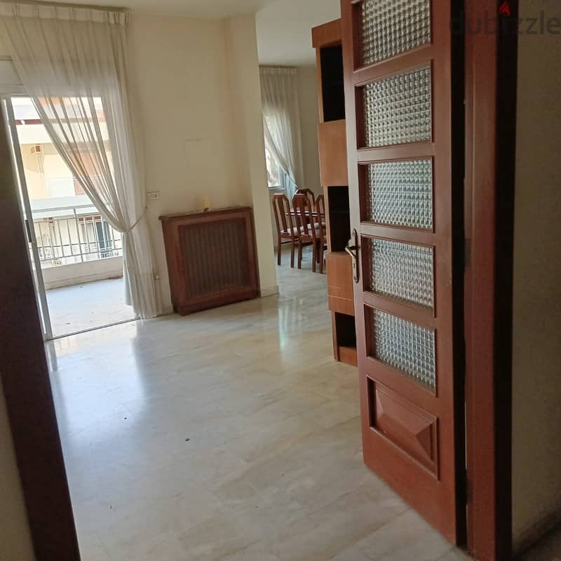 Furnished 200m2 apartment having open view for sale in Naccache 2