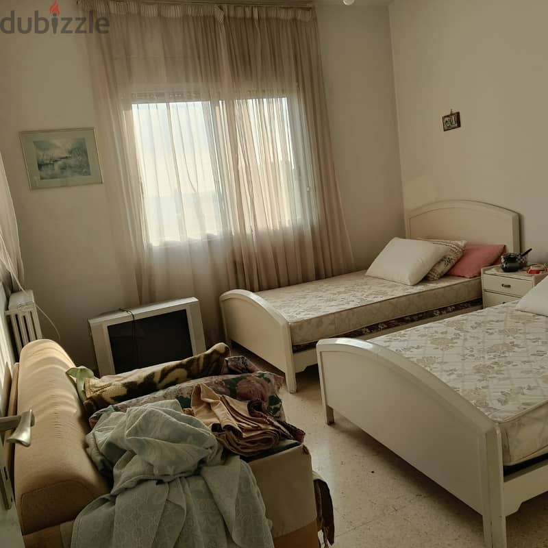 Furnished 200m2 apartment having open view for sale in Naccache 9